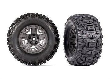 Tires & wheels, assembled, glued (charcoal gray 2.8" wheels, Sledgehammer® tires, foam inserts) (2) (TSM® rated)