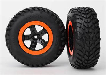 Traxxas - TRX5864 - Tire & wheel assy, glued (SCT, black, orange beadlock wheels, SCT off-road racing tires, foam inserts) (2) (2WD Front)