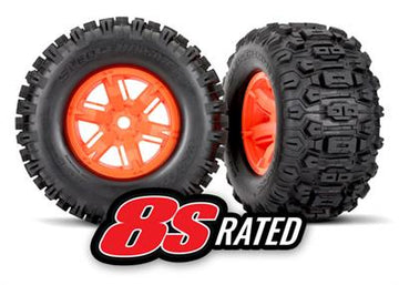 Traxxas - TRX7774T - Tires & wheels, assembled, glued (X-Maxx® orange wheels, Sledgehammer® tires, foam inserts) (left & right) (2)