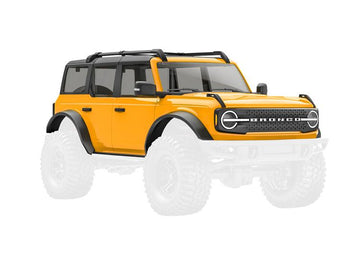 Traxxas - TRX9711-CYBER - Body, Ford Bronco, complete, Cyber Orange (includes grille, side mirrors, door handles, fender flares, windshield wipers, s