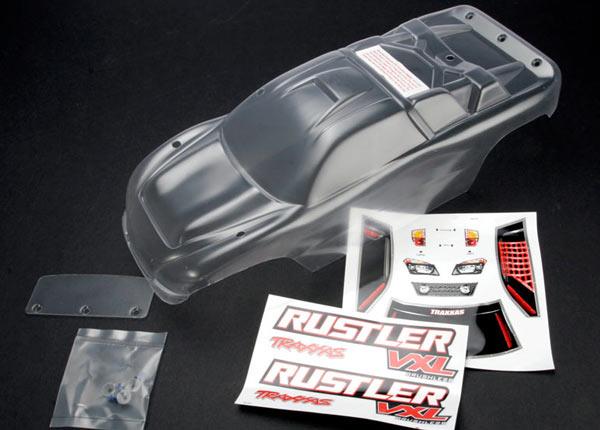 Traxxas - TRX3714 - Body, Rustler (clear, requires painting)/window, lights decal sheet/ wing and aluminum hardware